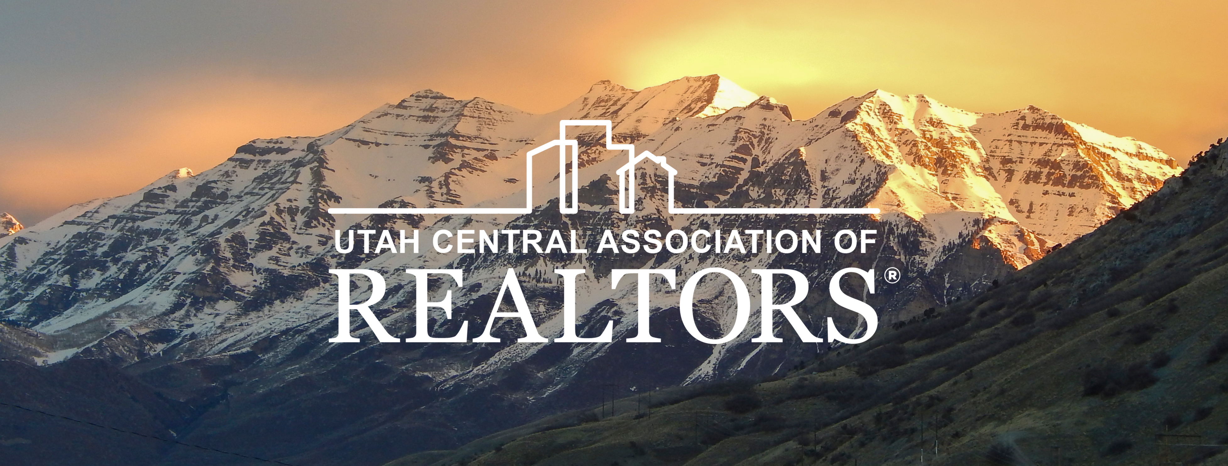 Image of snow-capped Mount Timpanogos at sunrise in Utah County with UCAOR logo overlaid